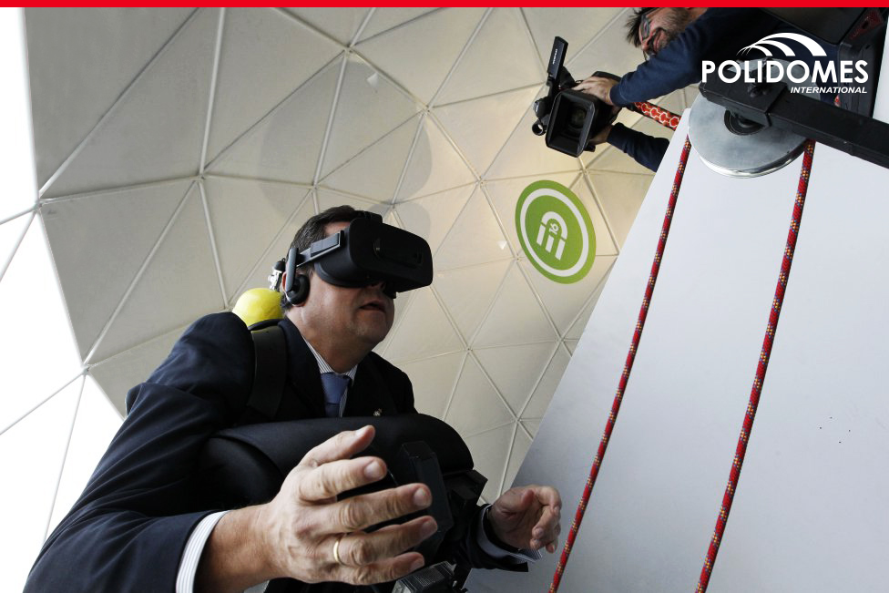 Business man testing virtual reality with 3D glasses during sporting exhibition in Polidomes geodesic tent