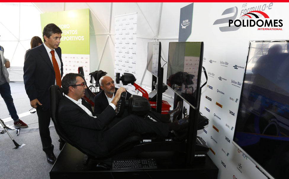 Business men taking part in Gaming technologies exhibition in geodesic tent